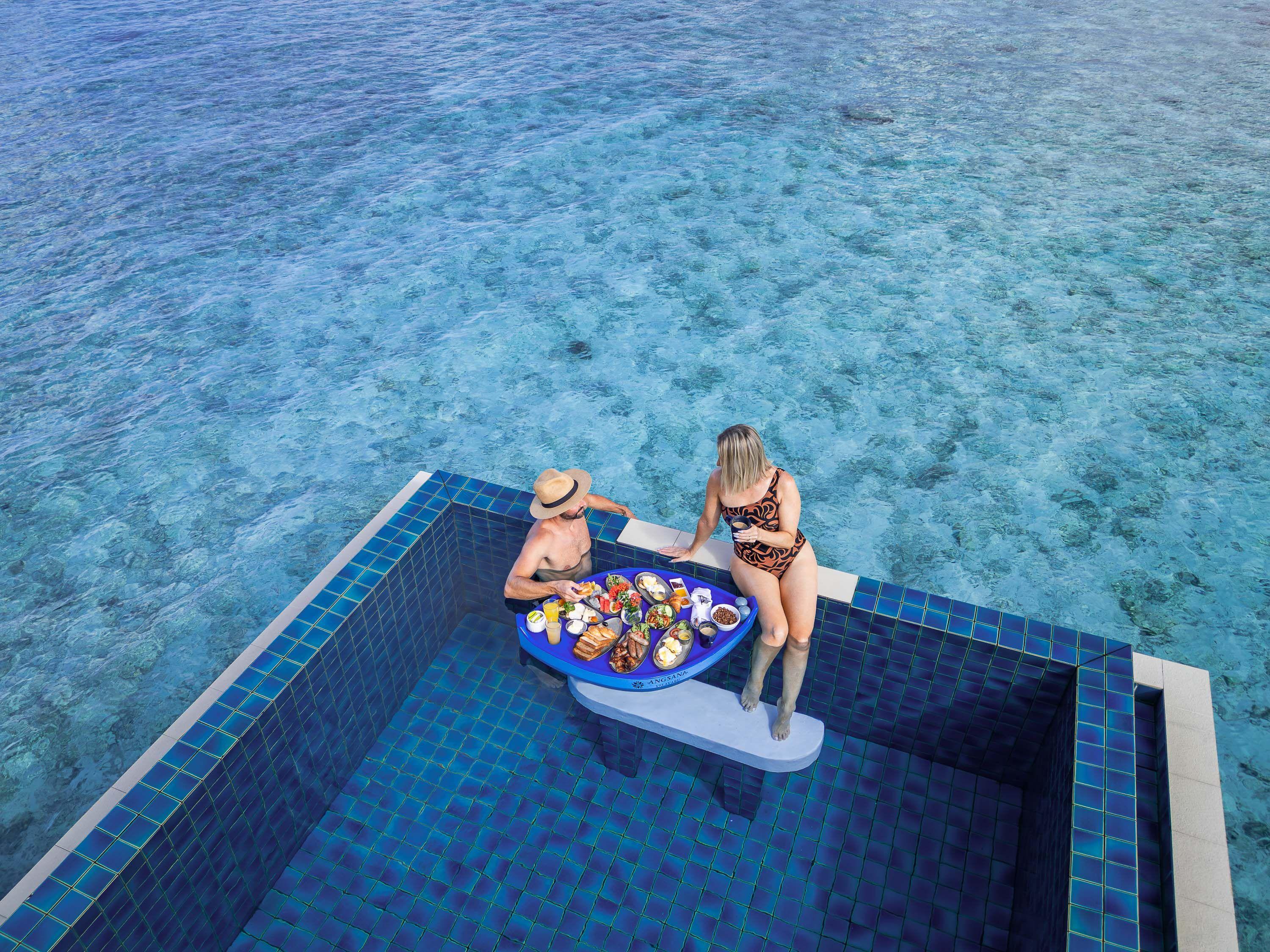 Angsana Velavaru Maldives - Dining - InVilla Dining - Floating Breakfast - Couple - 1.jpg