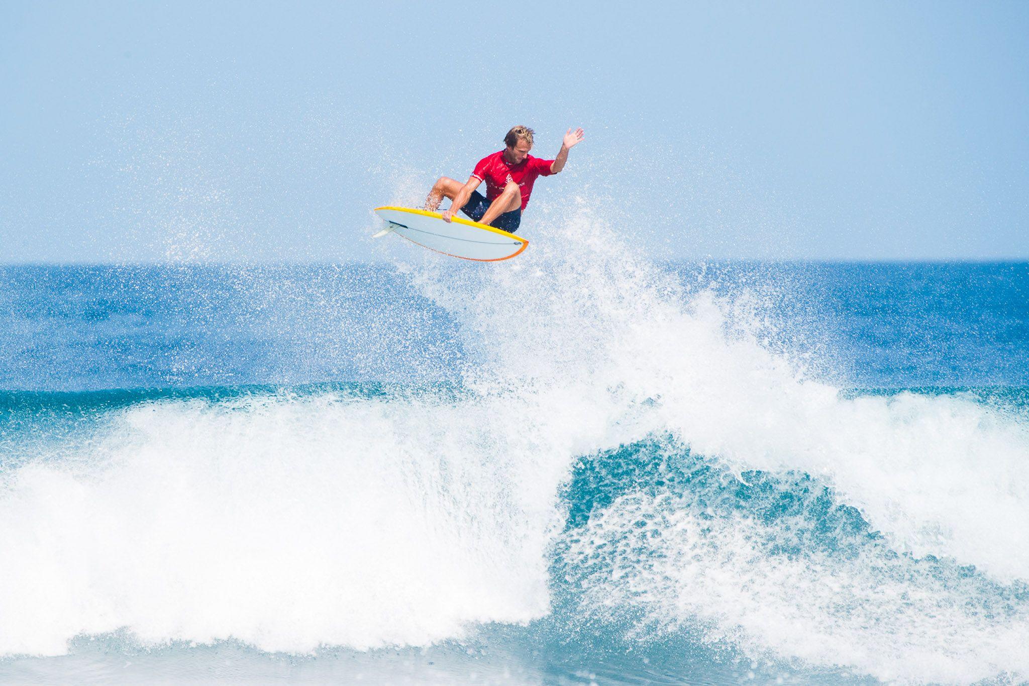 Four Seasons Resort Maldives at Kuda Huraa - Activities - Watersports - Surfing.jpg