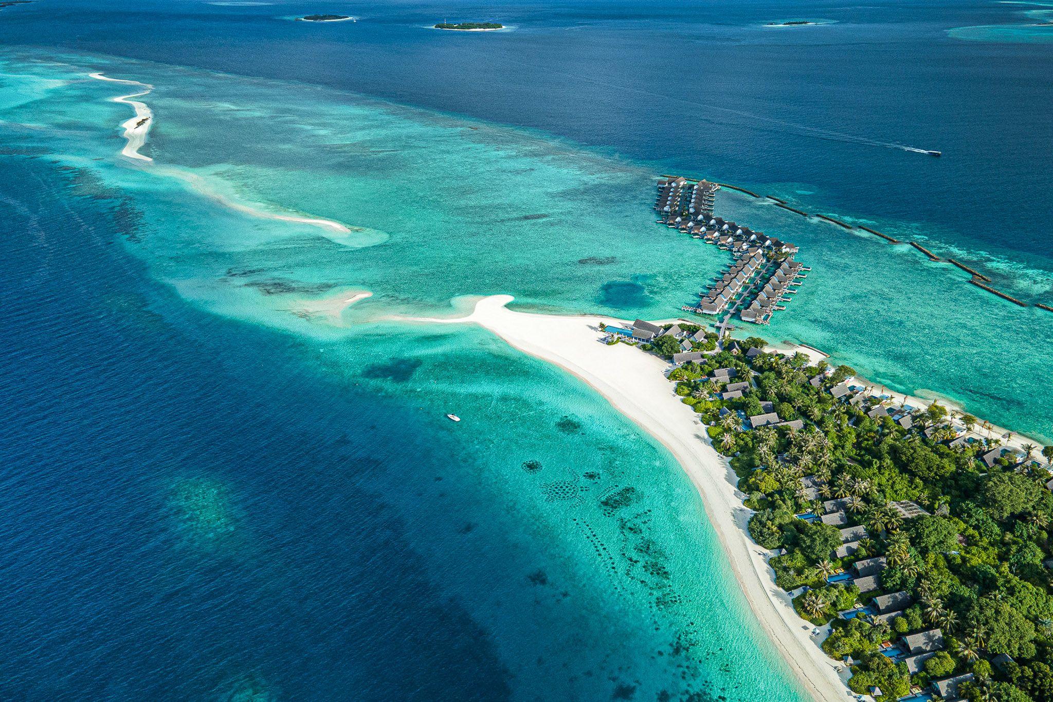 Four Seasons Resort Maldives at Landaa Giraavaru - Island Aerial View.jpg