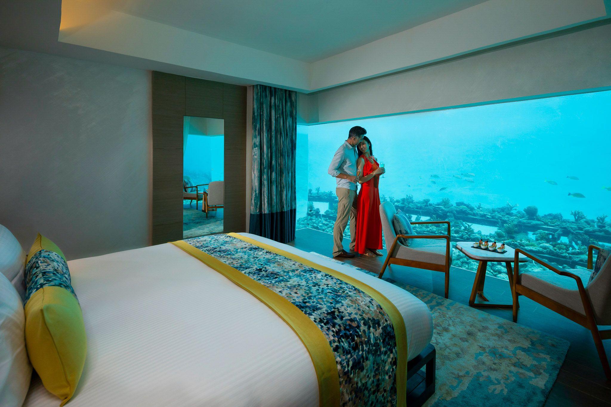 Pullman Maldives Maamutaa-Accommodation-Aqua-Villa-Couple.jpg