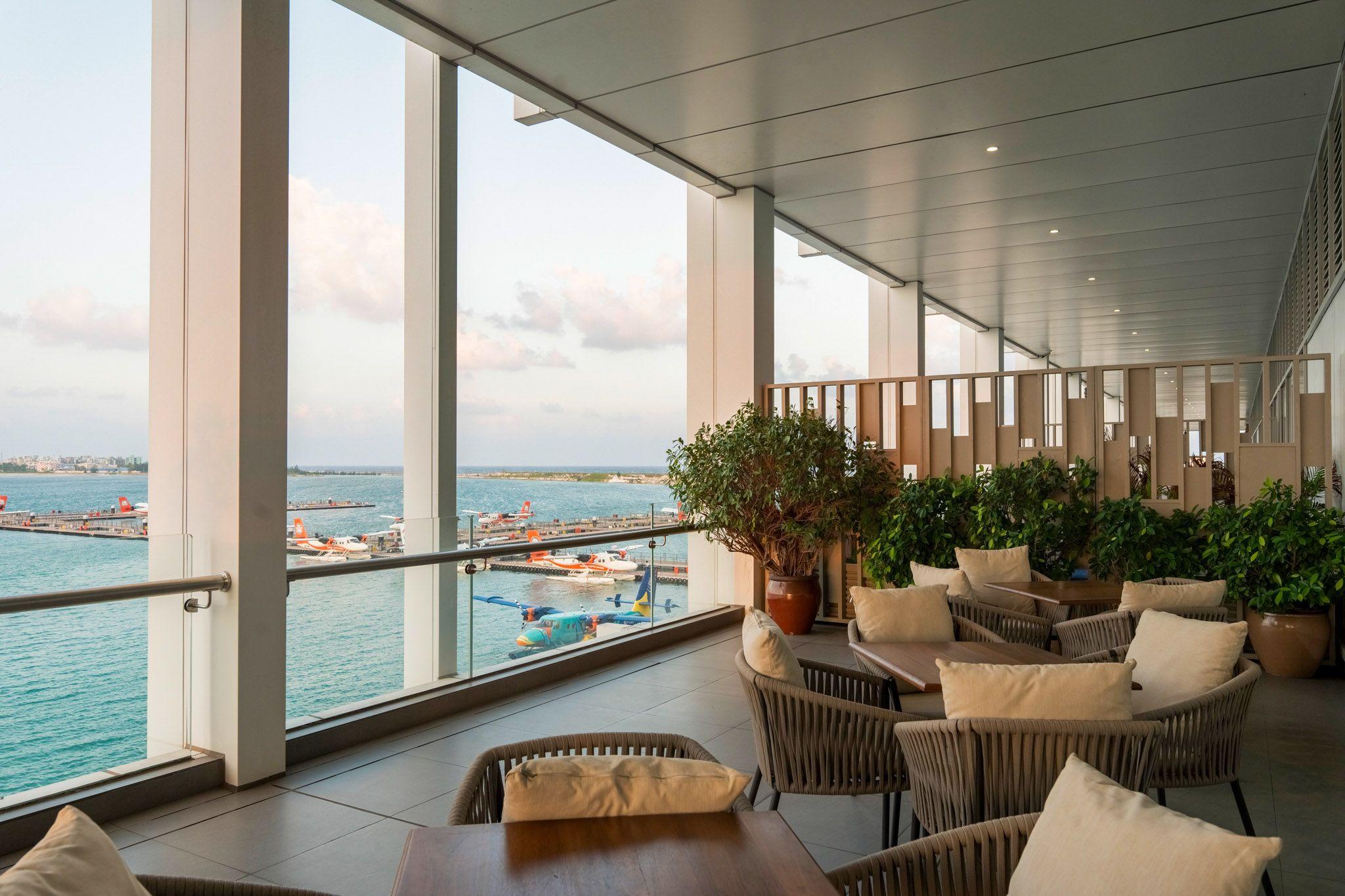 TMA Seaplane Lounges - Coral Lounge - Outdoor Seating.jpg